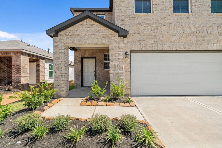 Exterior details and patio area of a home in Laurel Farms, Brookshire (Image 3). Exterior details and patio area of a home in Laurel Farms, Brookshire (Image 3).