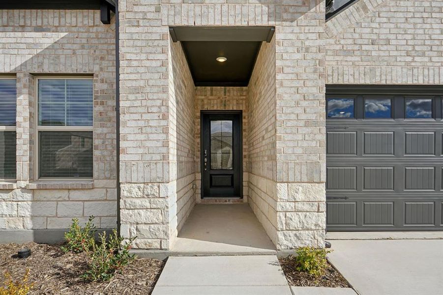 Exterior details and patio area of a home in Parks at Foster Crossing - Premier Series, Anna (Image 3). Exterior details and patio area of a home in Parks at Foster Crossing - Premier Series, Anna (Image 3).