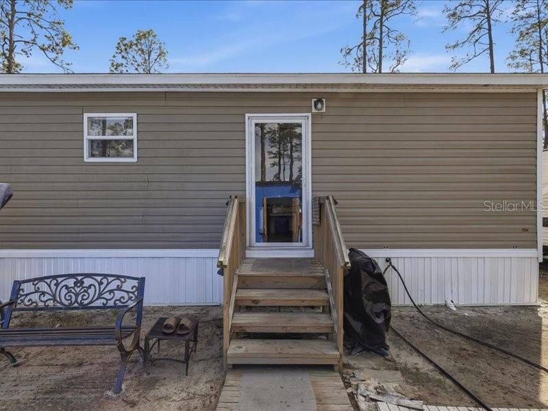 Exterior details and patio area of a home in , Bunnell (Image 24).