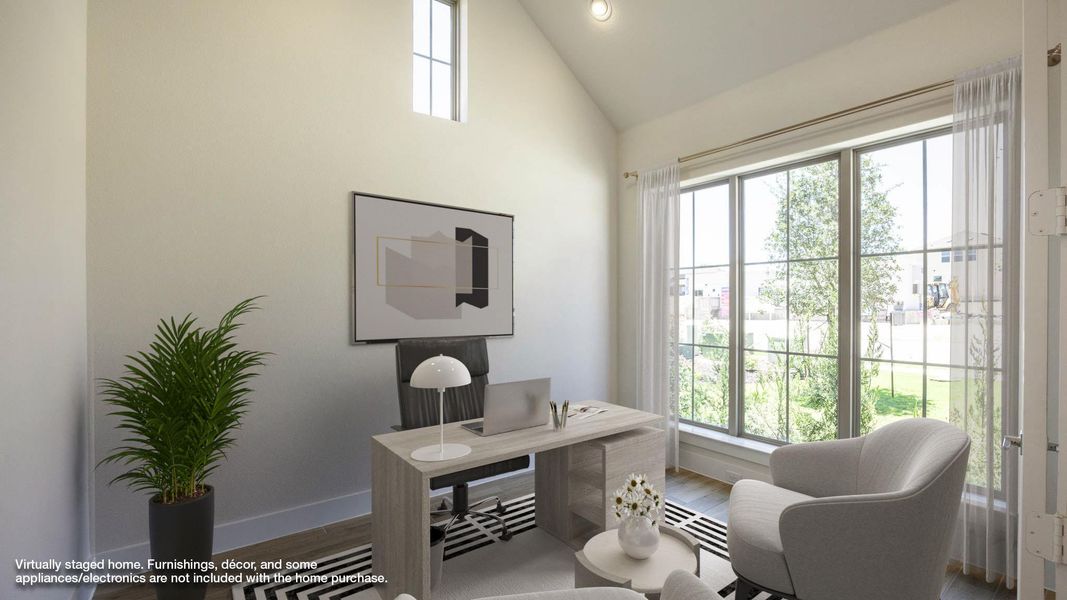 Office space featuring wood finished floors, high vaulted ceiling, recessed lighting, and radiator Office space featuring wood finished floors, high vaulted ceiling, recessed lighting, and radiator