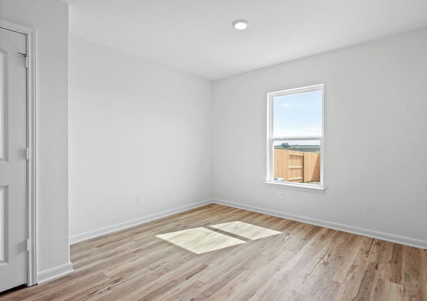 The dining room has a window that lets in tons of natural light