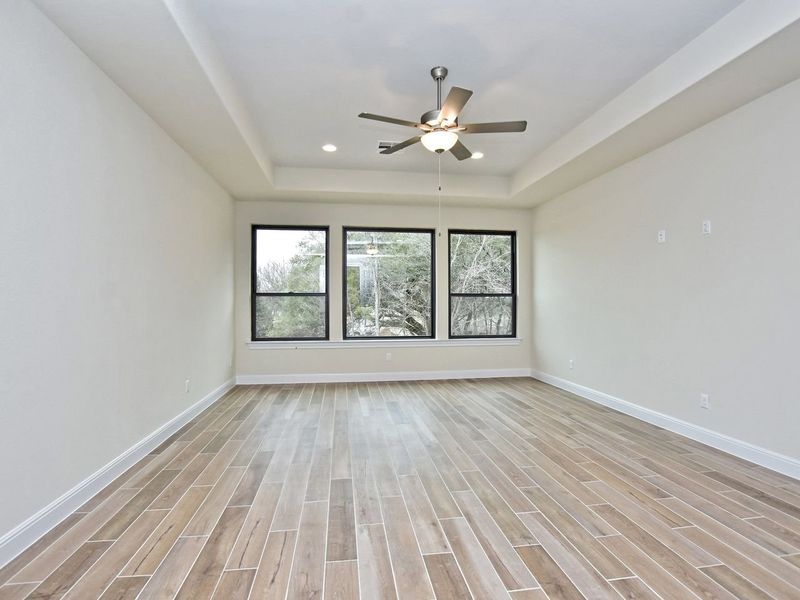Representative unfurnished interior of a home built from the Avalon by Giddens Homes in Scofield Farms Estates, Georgetown (Image 160).