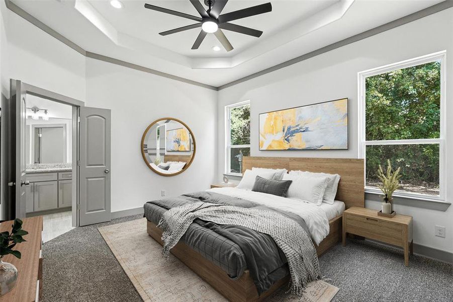 Virtually staged primary bedroom with a tray ceiling, carpet, ensuite bathroom, a ceiling fan, and recessed lighting Virtually staged primary bedroom with a tray ceiling, carpet, ensuite bathroom, a ceiling fan, and recessed lighting