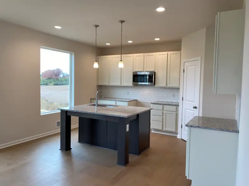 Representative furnished interior of a home built from the The Eaton by Norfolk Homes in Offsite Builds Southern Michigan, Ann Arbor (Image 8).