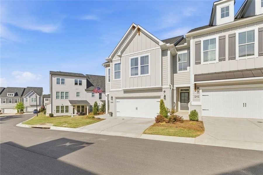 Front exterior of a new home in , Cumming, GA, highlighting curb appeal (Image 25).