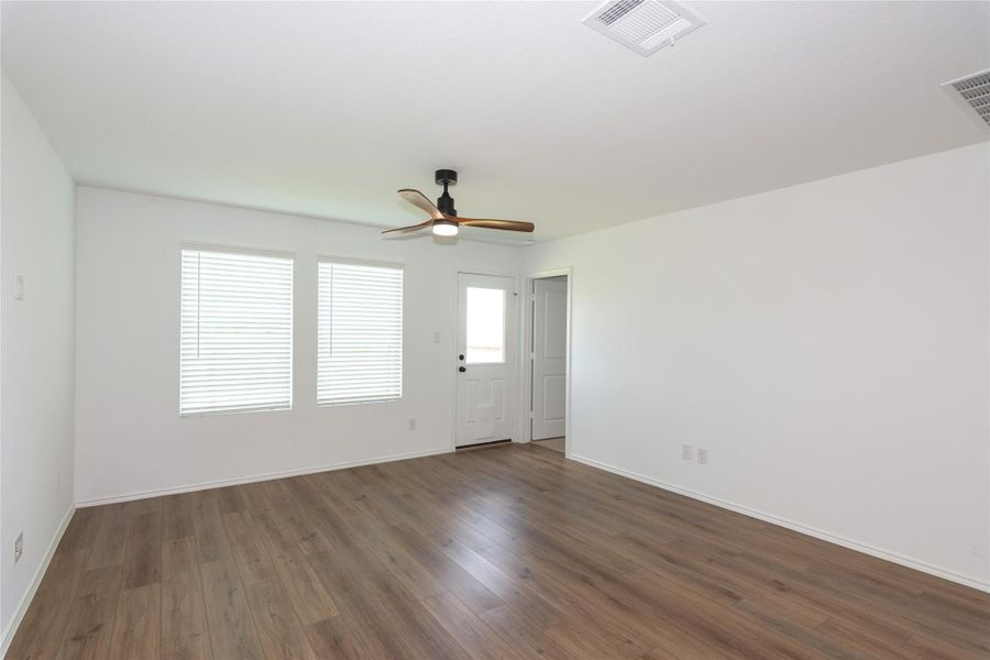 The living room is filled with natural light.