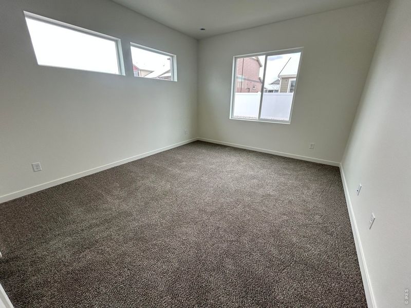 Spacious, unfurnished interior of a new home in Union Colony West, Greeley (Image 15).