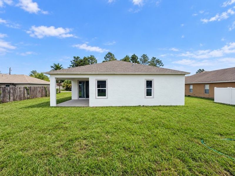 Exterior details and patio area of a home in Palm Coast, Palm Coast (Image 4).