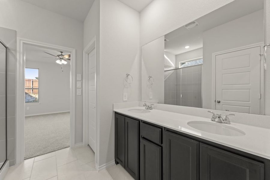 Representative furnished interior of a home built from the Birch by Impression Homes in Churchill, Anna (Image 12).