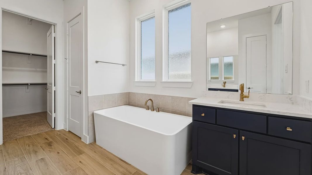 Representative furnished interior of a home built from the Cayman by Chesmar Homes in Crescent Bluff, Georgetown (Image 18).