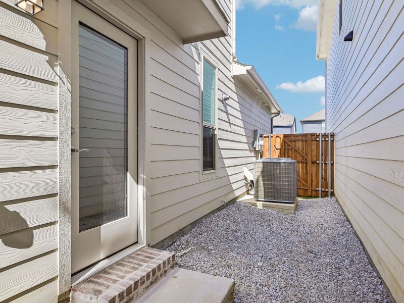 Exterior details and patio area of a home in Oak Ridge Park, Corinth (Image 3).