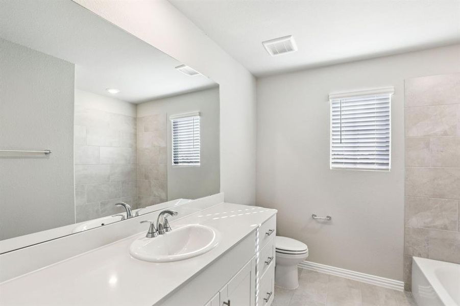 Furnished interior view inside a new home in Simpson Crossing - Spring Series, McKinney (Image 13). Furnished interior view inside a new home in Simpson Crossing - Spring Series, McKinney (Image 13).