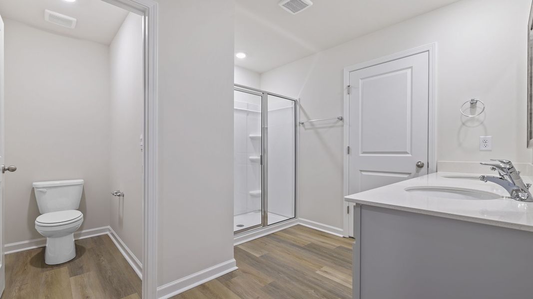 Furnished interior view inside a new home in Bentley Park, Greenwood (Image 13). Furnished interior view inside a new home in Bentley Park, Greenwood (Image 13).