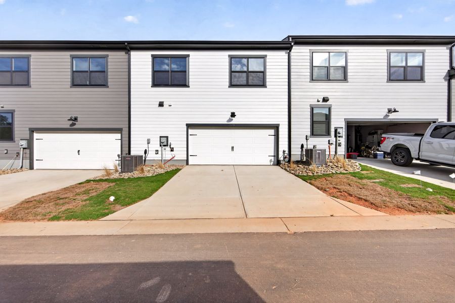 Exterior details and patio area of a home in Seven Oaks, Belmont (Image 25).