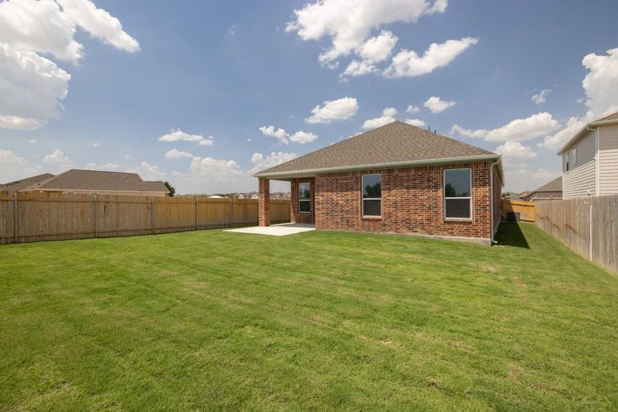Exterior details and patio area of a home in Overlook Ranch, Georgetown (Image 19).