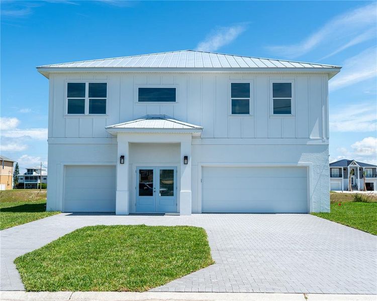 Front exterior of a new home in , Hudson, FL, highlighting curb appeal (Image 18).