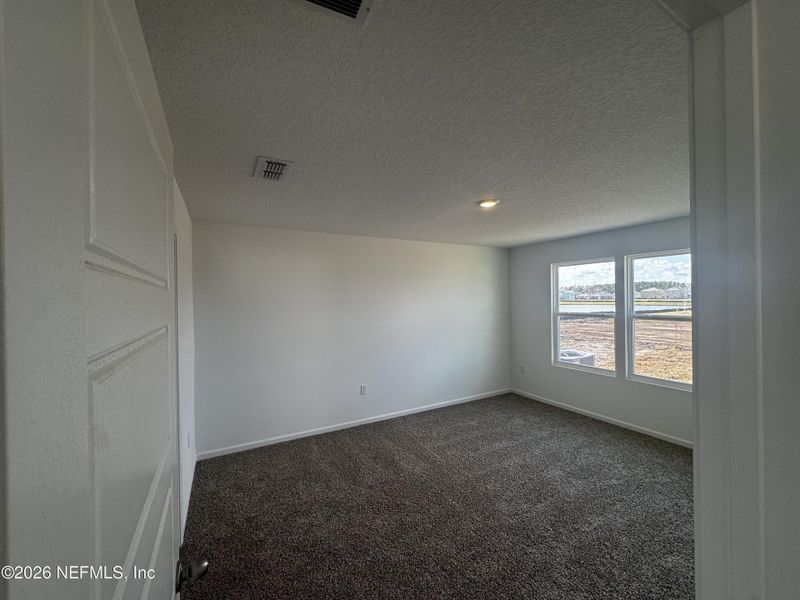 Spacious, unfurnished interior of a new home in The Arbors, Jacksonville (Image 45).