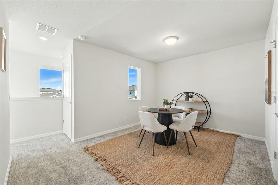 Furnished interior view inside a new home in Amelia Groves, St. Cloud (Image 12).