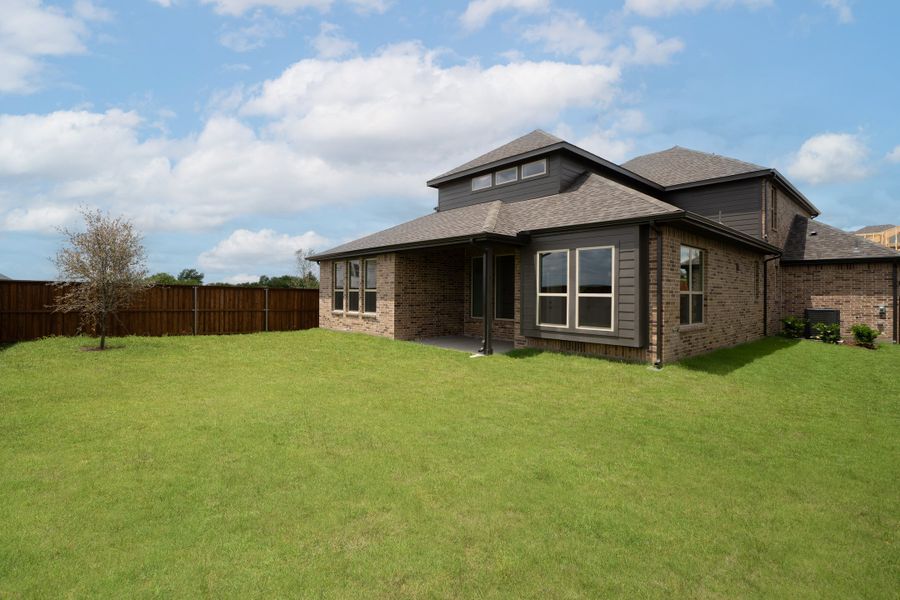 Exterior details and patio area of a home in Enclave at Legacy Hills, Celina (Image 2).