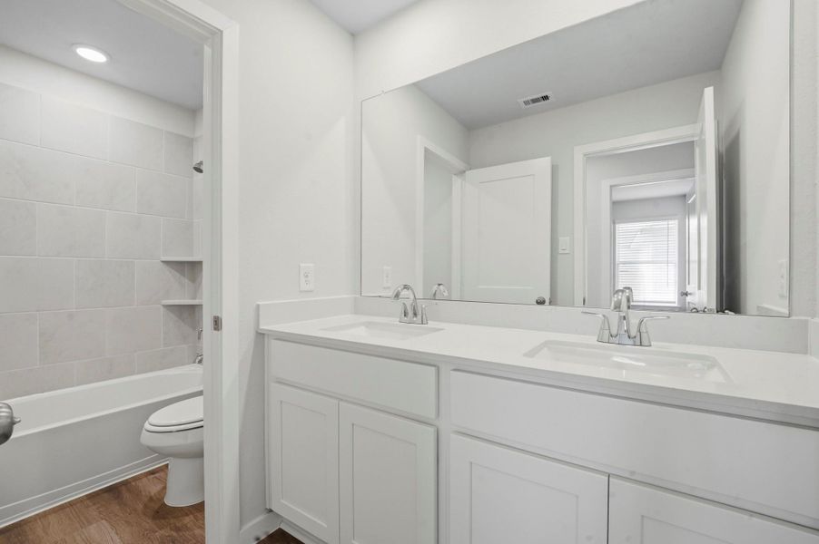 Furnished interior view inside a new home in Barrett Crossing, Crosby (Image 10).