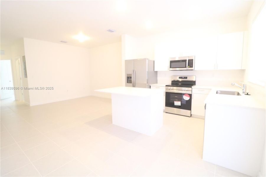 Furnished interior view inside a new home in , Homestead (Image 5). Furnished interior view inside a new home in , Homestead (Image 5).