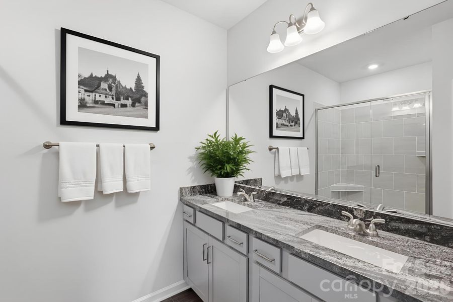 Virtually staged primary bathroom Virtually staged primary bathroom