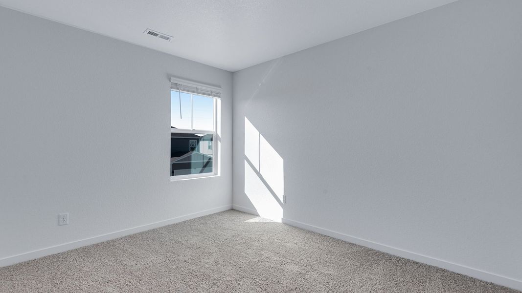Spacious, unfurnished interior of a new home in Sky Ranch, Watkins (Image 16).