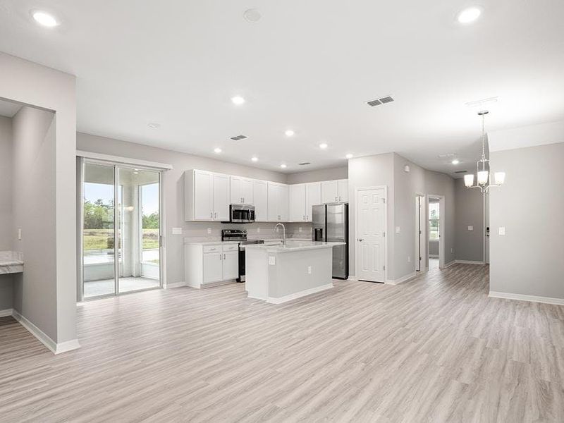 Enjoy a sunny, open living area - Capri bungalow by Highland Homes Enjoy a sunny, open living area - Capri bungalow by Highland Homes