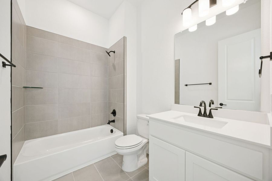 Furnished interior view inside a new home in Newman Village Townhomes, Frisco (Image 13).