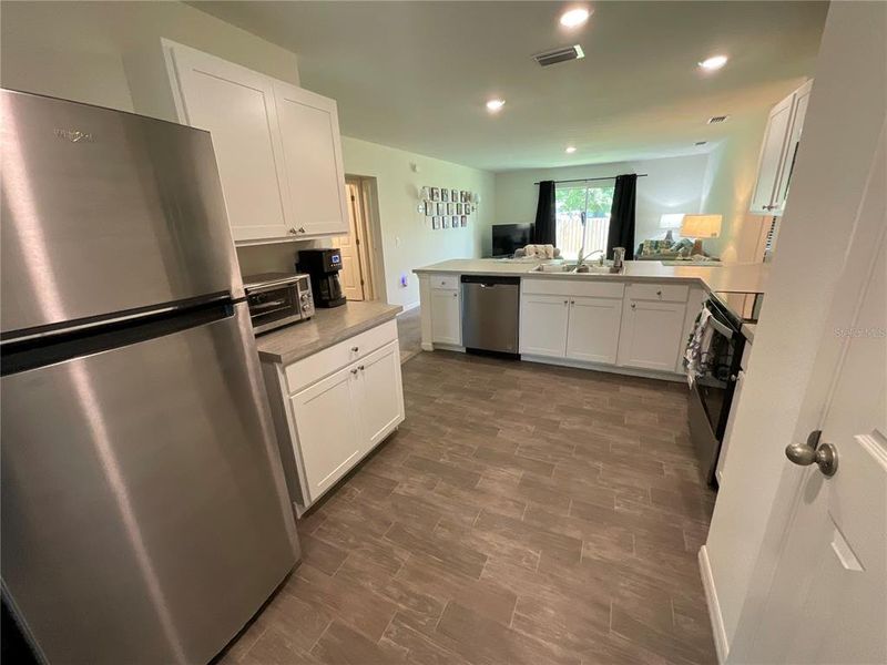 Furnished interior view inside a new home in , Port Charlotte (Image 19).