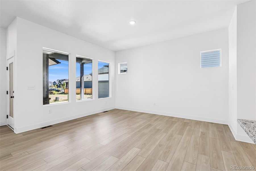 Spacious, unfurnished interior of a new home in Painted Prairie Cottage, Aurora (Image 32).