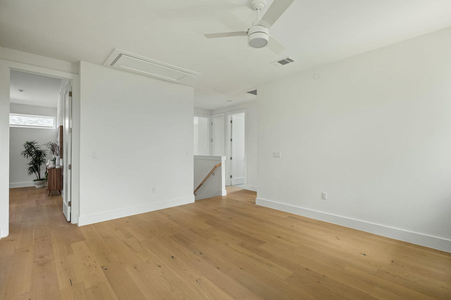 Luminous interior spaces feature polished hardwood floors and high ceilings. Luminous interior spaces feature polished hardwood floors and high ceilings.