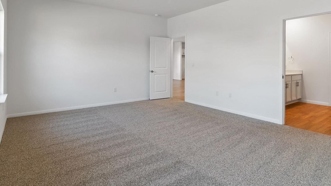 Spacious, unfurnished interior of a new home in Bar W Ranch, Leander (Image 13).