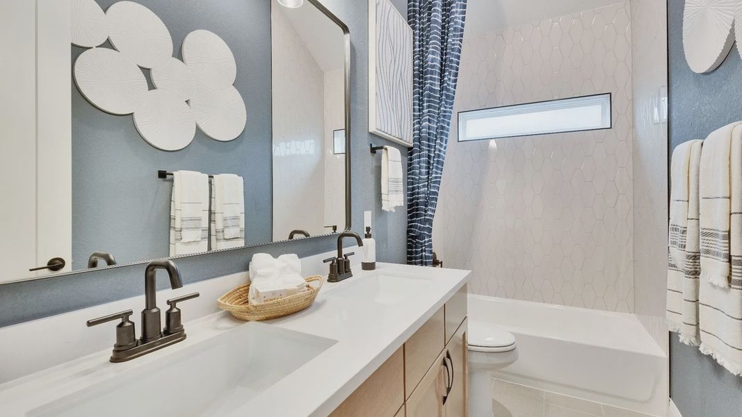 Model home photos of similar floorplans, not pictures of actual home.