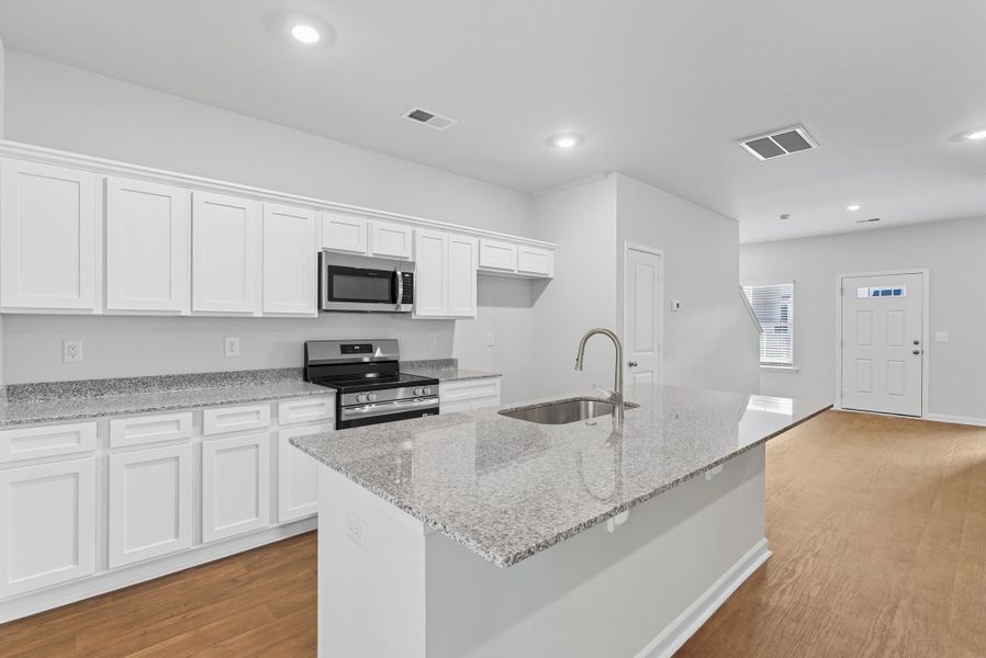 Representative furnished interior of a home built from the Palmetto II by McGuinn Homes in Clarke Townes, Anderson (Image 9).