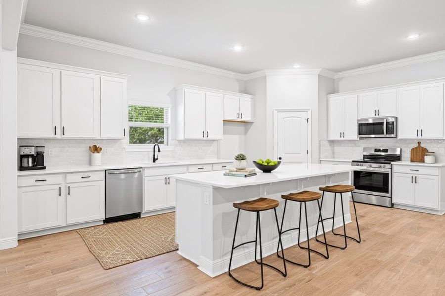Front exterior of a new home in Sentinel Ridge, Pace, FL, highlighting curb appeal (Image 1). Front exterior of a new home in Sentinel Ridge, Pace, FL, highlighting curb appeal (Image 1).