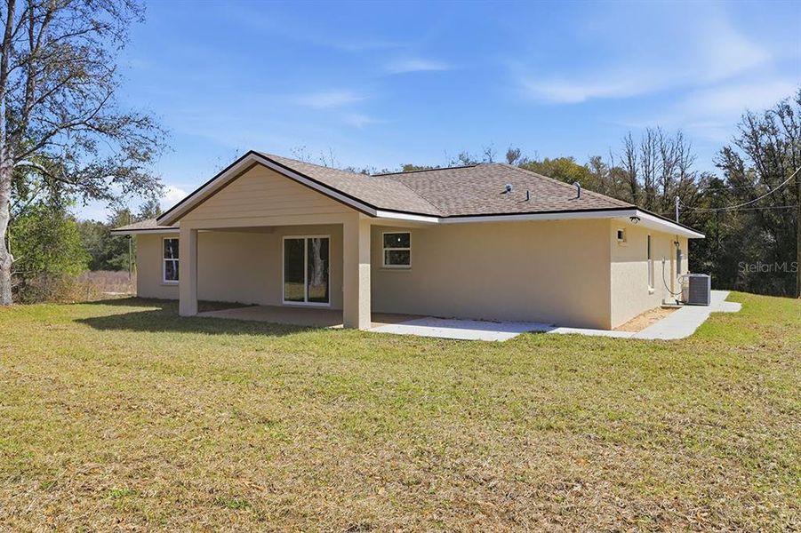 Exterior details and patio area of a home in , Citrus Springs (Image 20).