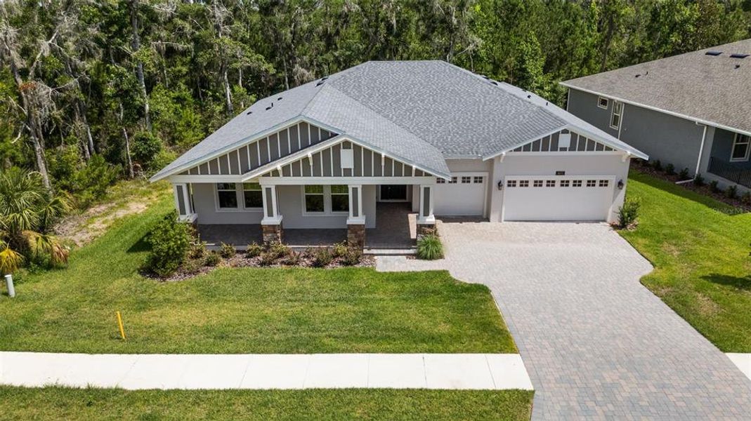 Front exterior of a new home in Southern Hills Plantation, Brooksville, FL, highlighting curb appeal (Image 20).