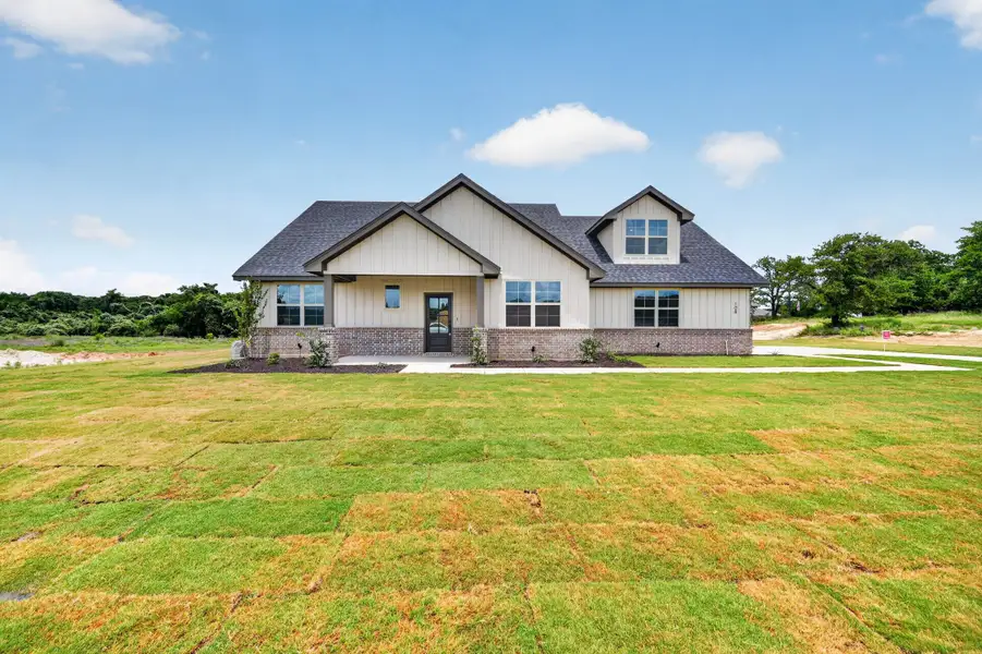 Representative exterior photo of a completed home built from the Garrison III by Cheldan Homes in Arbor Oaks, Boyd, TX (Image 20).