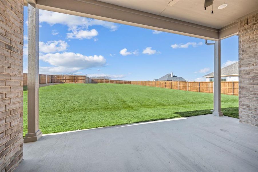 Exterior details and patio area of a home in Settlers Glen, New Fairview (Image 4).