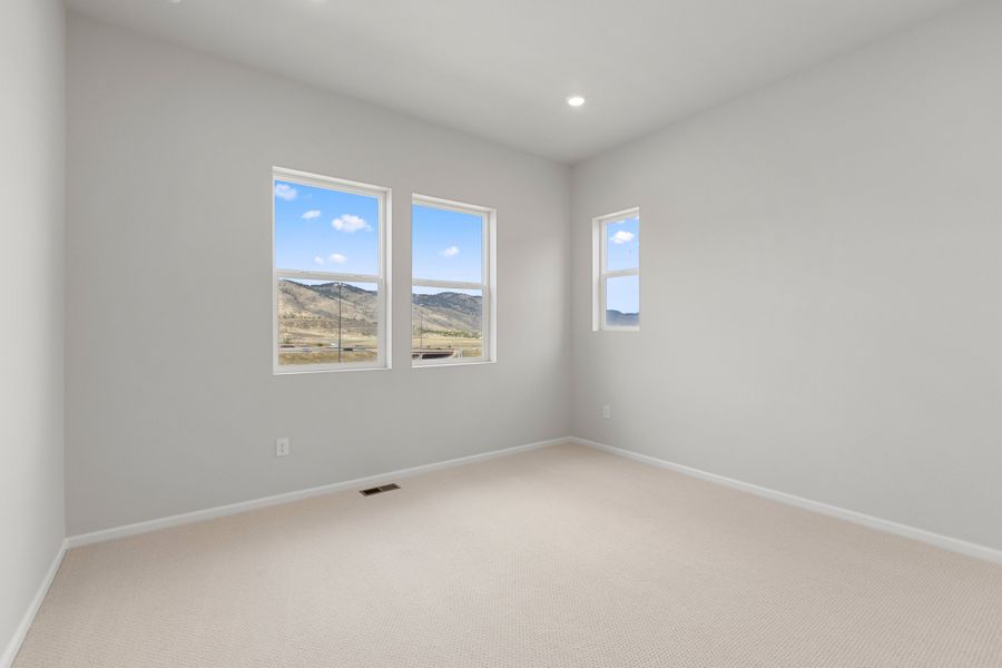 Spacious, unfurnished interior of a new home in The Manors Collection at Golden Overlook, Lakewood (Image 12).