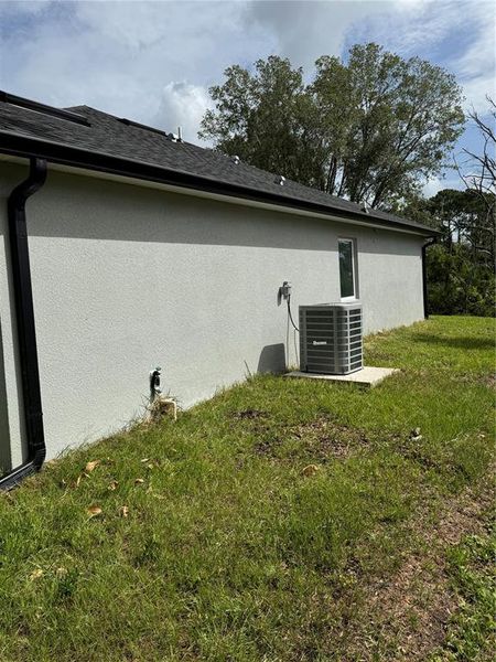 Front exterior of a new home in , Deltona, FL, highlighting curb appeal (Image 1).