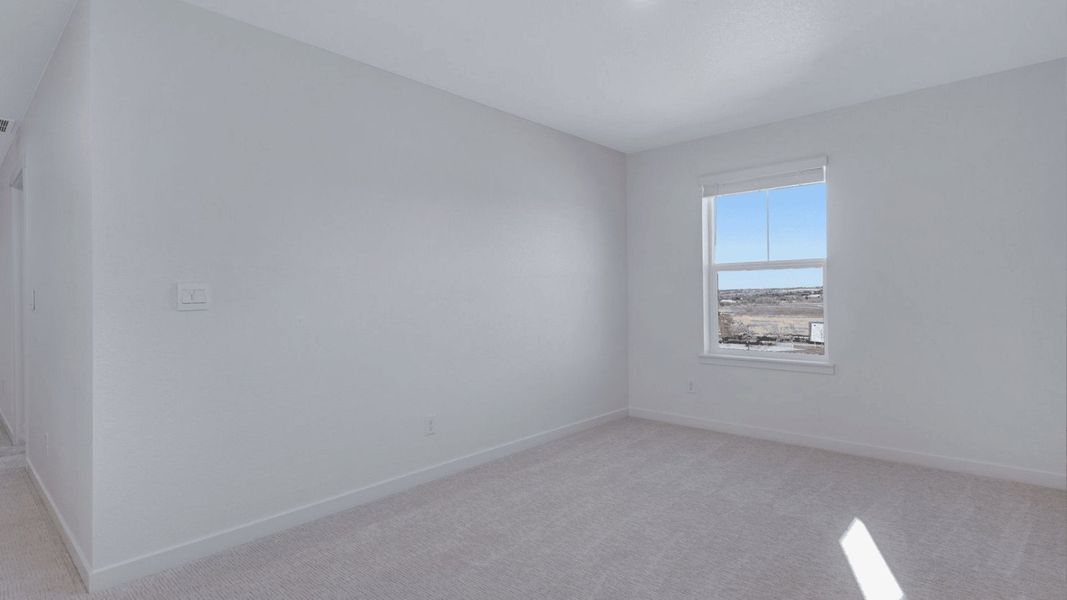 Spacious, unfurnished interior of a new home in Trails at Crowfoot, Parker (Image 14).