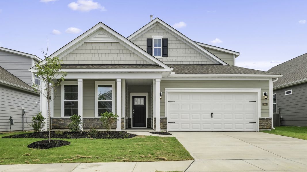 Front exterior of a new home in The Villas at Kinsley, Jamestown, NC, highlighting curb appeal (Image 1). Front exterior of a new home in The Villas at Kinsley, Jamestown, NC, highlighting curb appeal (Image 1).