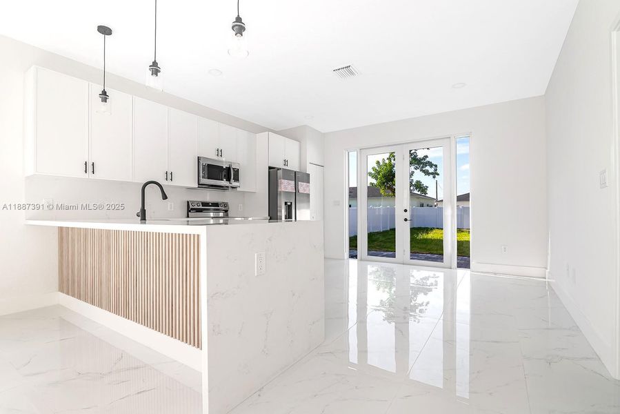 Furnished interior view inside a new home in , Dania Beach (Image 6). Furnished interior view inside a new home in , Dania Beach (Image 6).