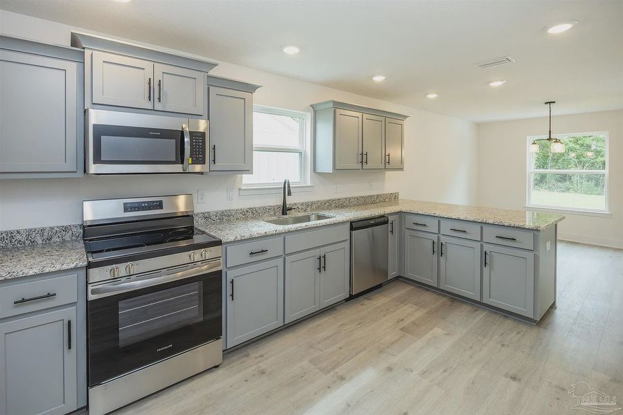 Furnished interior view inside a new home in Parkland Place, Pace (Image 6).