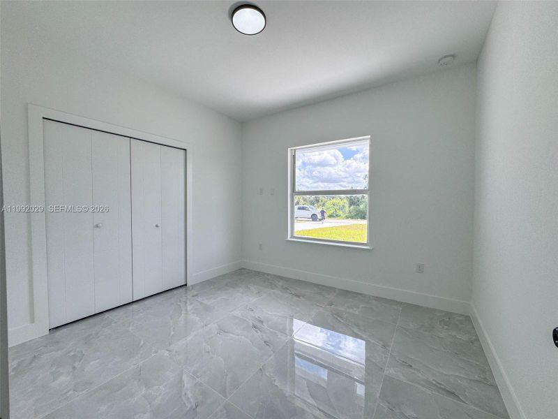 Spacious, unfurnished interior of a new home in , Lehigh Acres (Image 15).