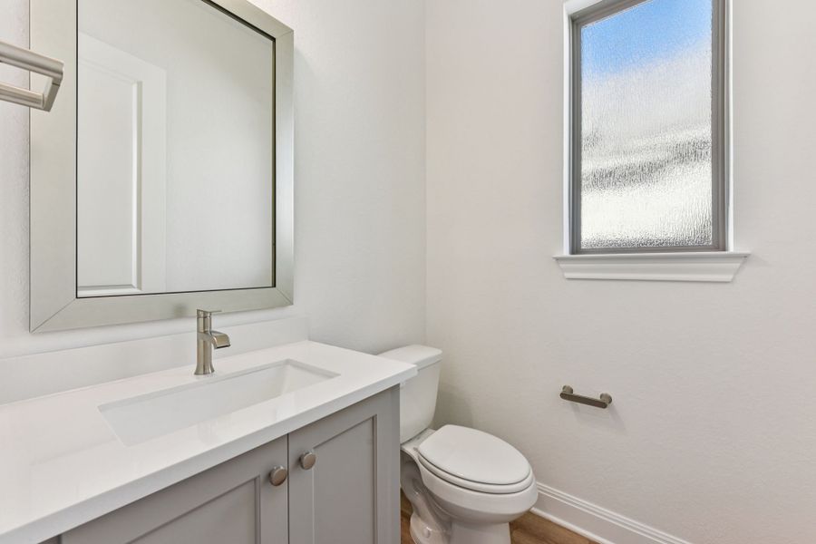 Furnished interior view inside a new home in 6 Creeks, Kyle (Image 8).