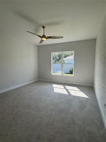 Spacious, unfurnished interior of a new home in Laureate Village, Newberry (Image 35).