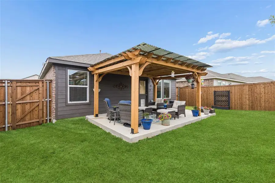 Exterior details and patio area of a home in , Pilot Point (Image 23). Exterior details and patio area of a home in , Pilot Point (Image 23).